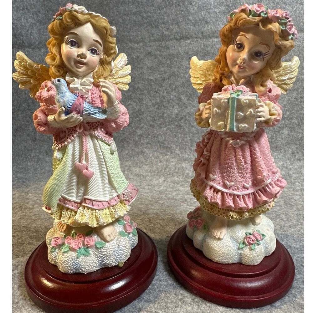 Christmas Around the World 1990s Giving Angels holding present & 1 w/blue bird